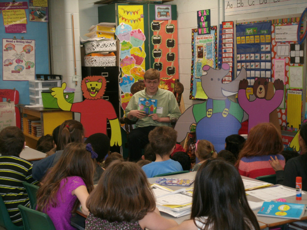 Jack is shown recently reading to a group of NH second graders 